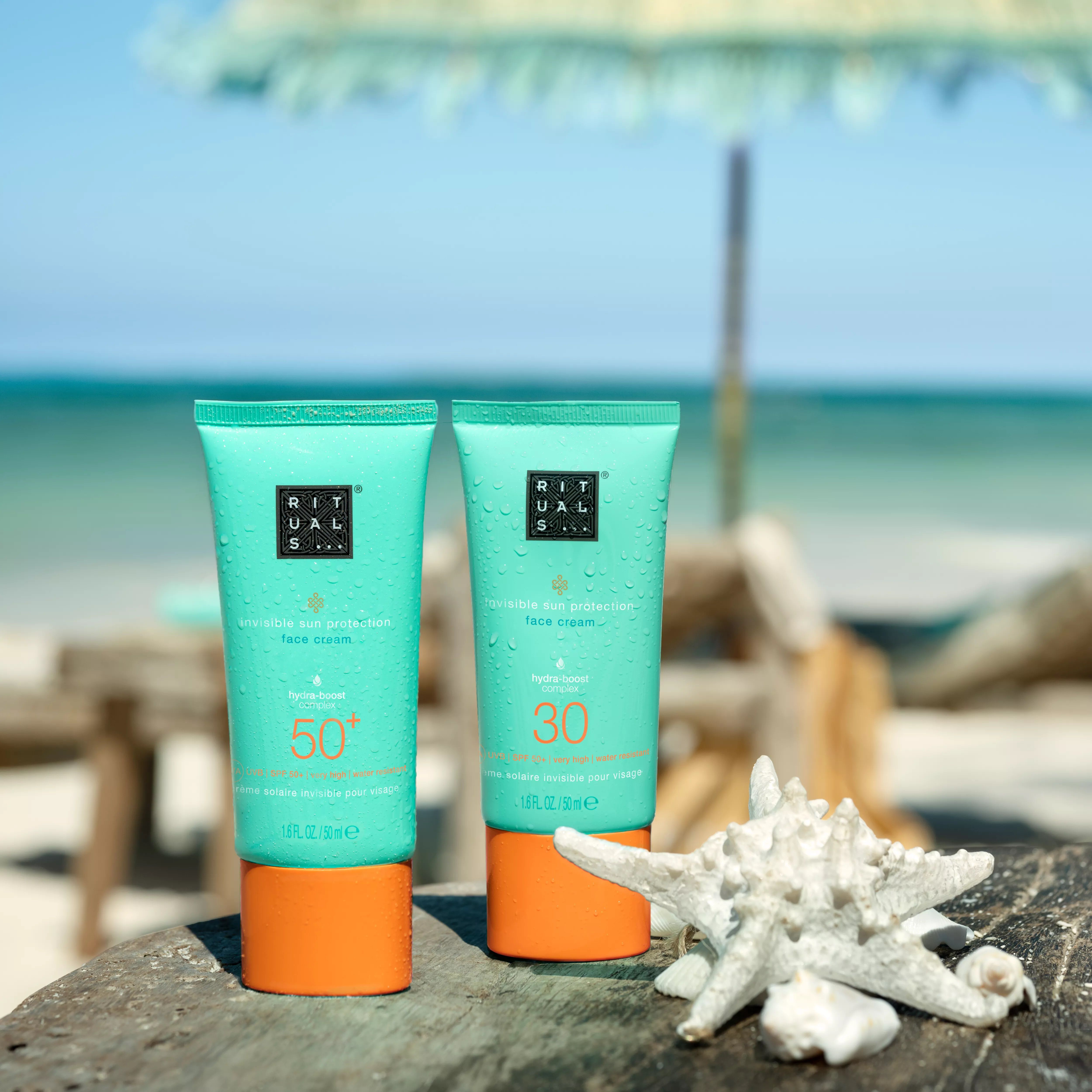 Tubes of The Ritual of Karma sunscreen face cream in SPF 50 and SPF 30.
